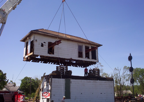 Crane Sets Top Half of Tower