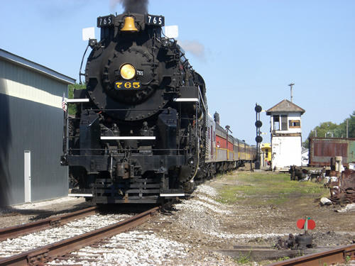 Nickel Plate Road 765 rolls past Grasselli Tower